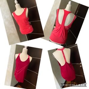 Two Nike tops. One NWT- ; SECOND no tag NEW